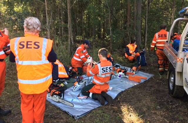 NSW SES members gather together equipment to help in the investigation. Photo: NSW SES Mid North Coast region. 