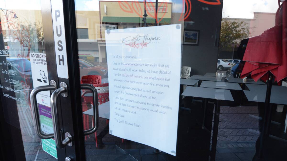 A letter posted on the doors of Taree's Cafe Thyme explains to customers that the business remains closed during the COVID-19 restrictions.