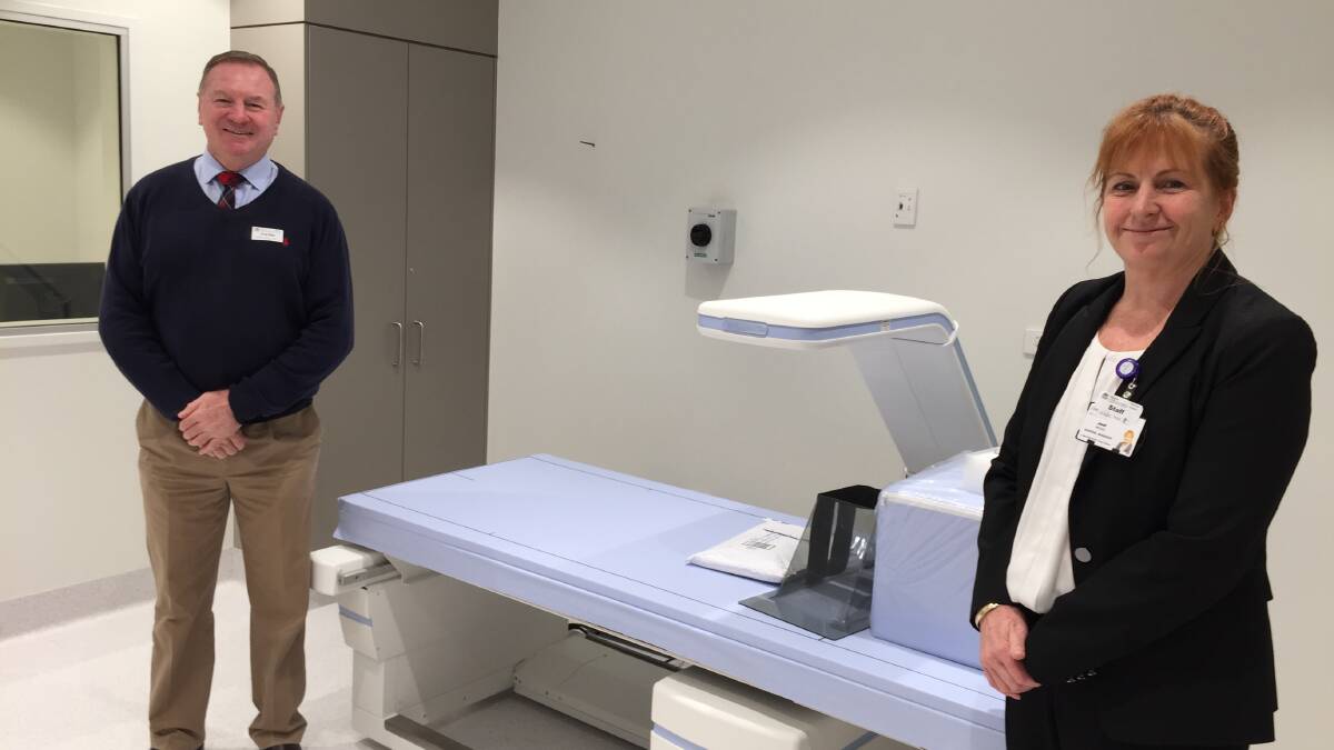Member for Myall Lakes, Stephen Bromhead, and Manning Base Hospital general manager, Jodi Nieass, show off some of the new medical imaging department's state-of-the-art facilities.