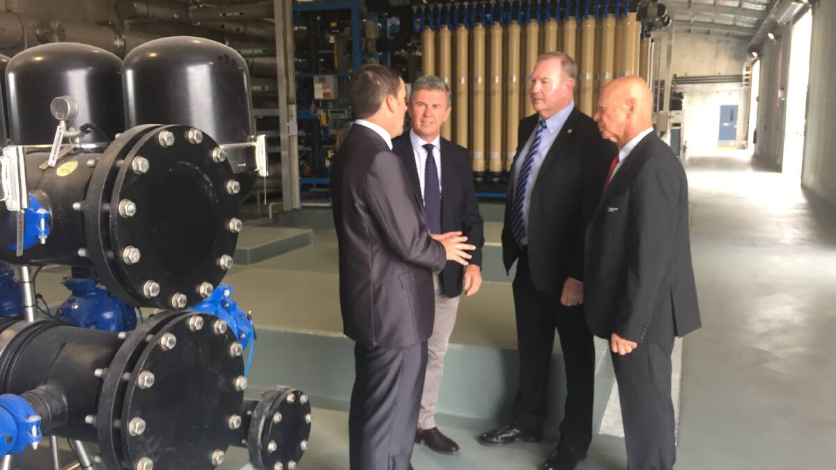 MidCoast Council's director of water services, Brendan Guiney, explains the workings of the Nabiac Aquifer Water Treatment Plant to (L to R) Federal member David Gillespie, State member Stephen Bromhead, and mayor David West.