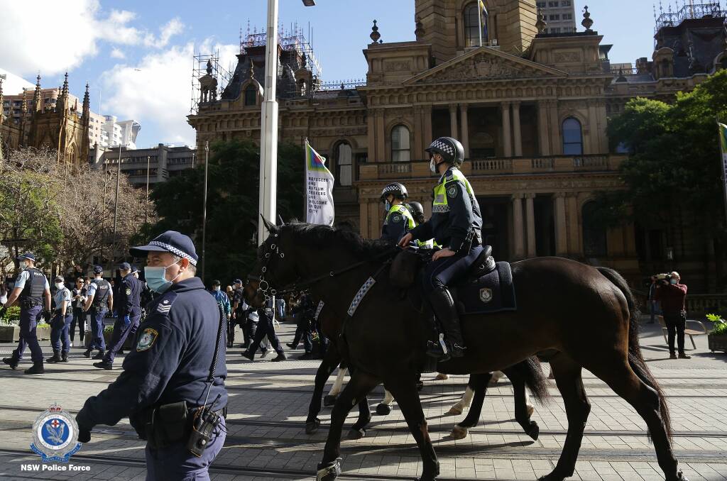 On patrol: Police during the unauthorised Sydney CBD protest. Photo: NSW Police.