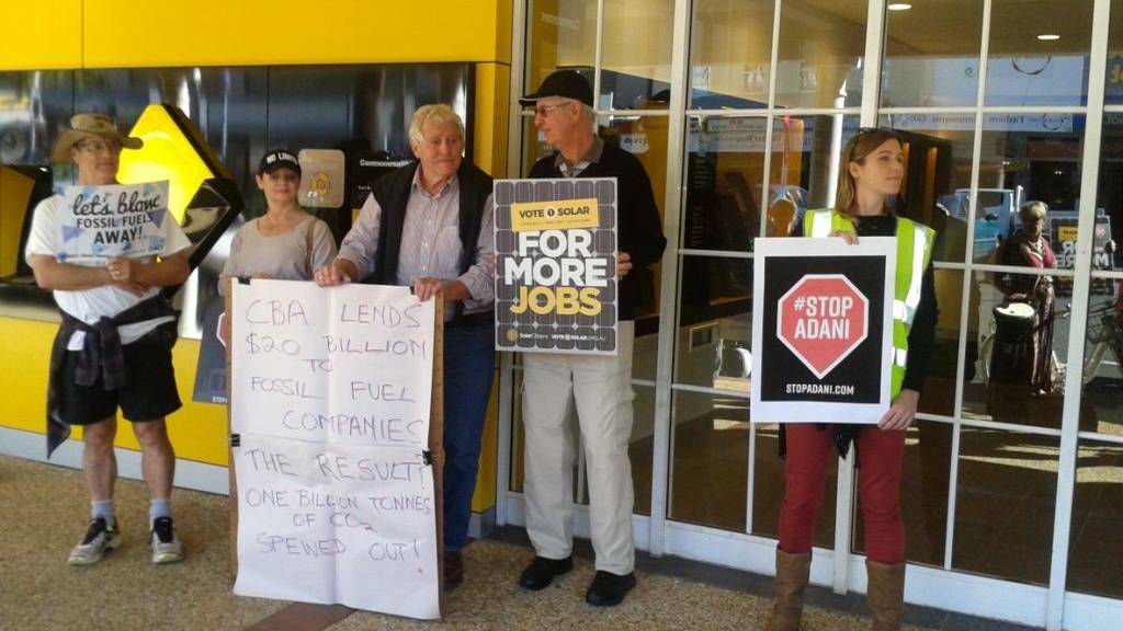 Stop Adani campaigners outside CBA in Port Macquarie.