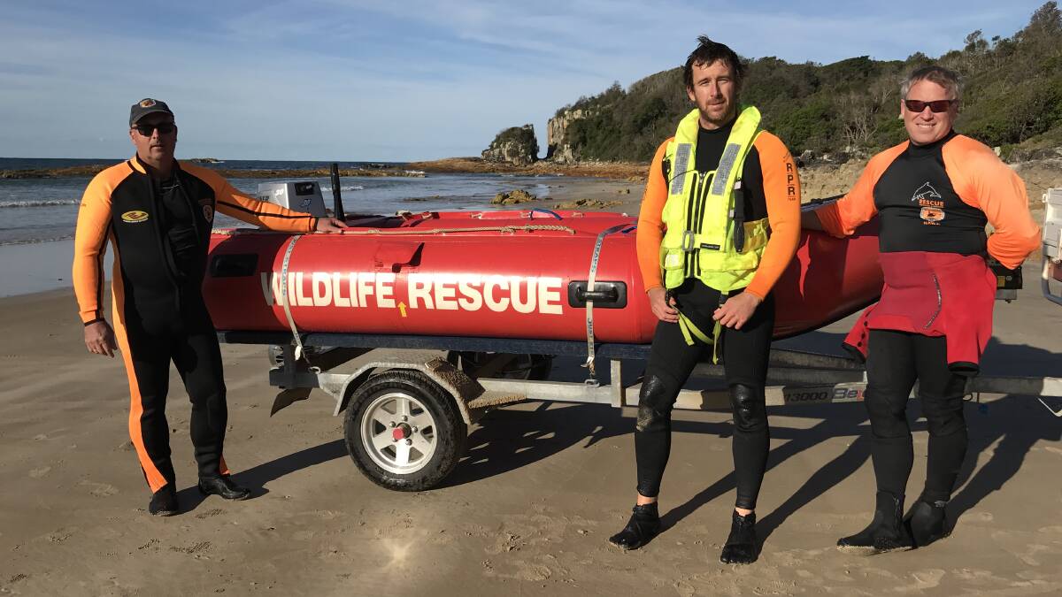 Andy Marshall, Col Waters and Luke Winters launched the inflatable rescue vessel from the beach at Diamond Head shortly after 12pm.