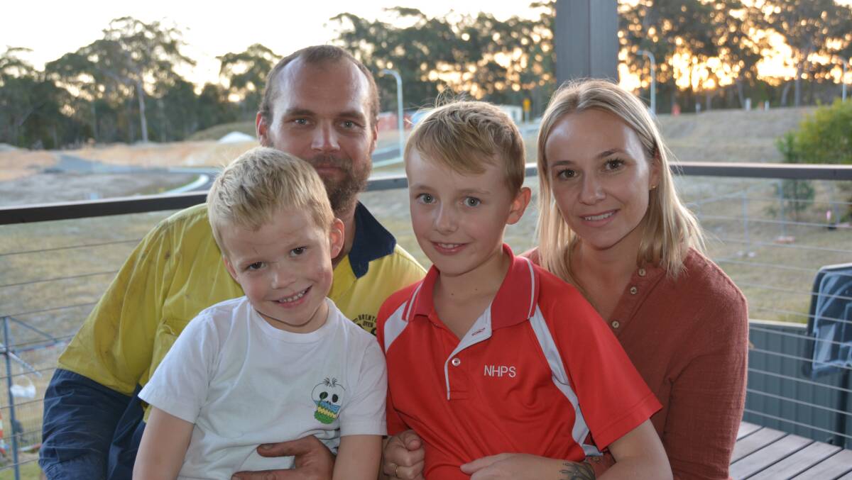 SAFE AND HEALING: Lewis Dyer, left, and Jedd with parents Brenton and Bev