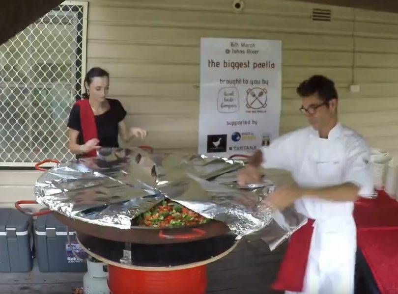 Big paella: Local organiser Ana Martin and Spanish chef Zaratustra De Souza-Pinto combined the gargantuan dish in John's River.