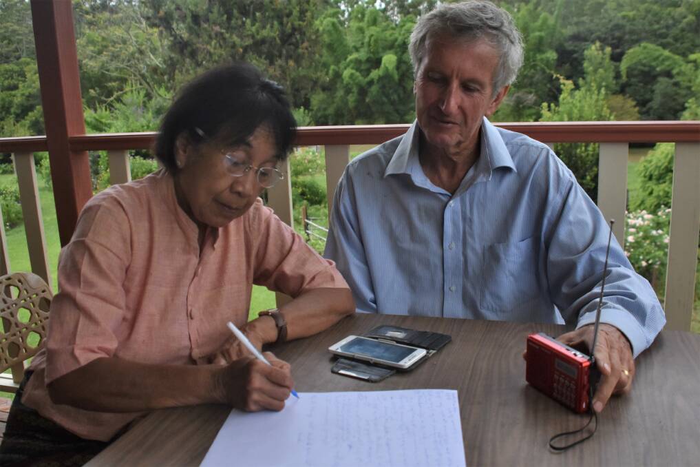 MYANMAR PROTEST: Tin Hta Nu and Ian Oxenford penning a letter to the UN.