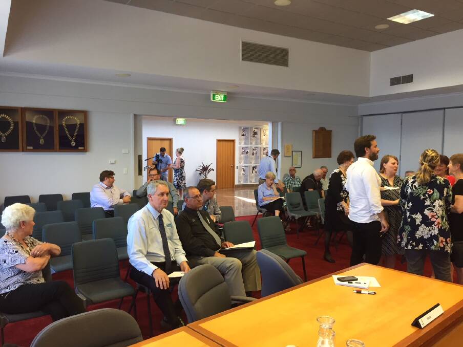 The Taree council chambers were attended by about 20 members of the public, who engaged in conversation with councillors before the meeting commenced.