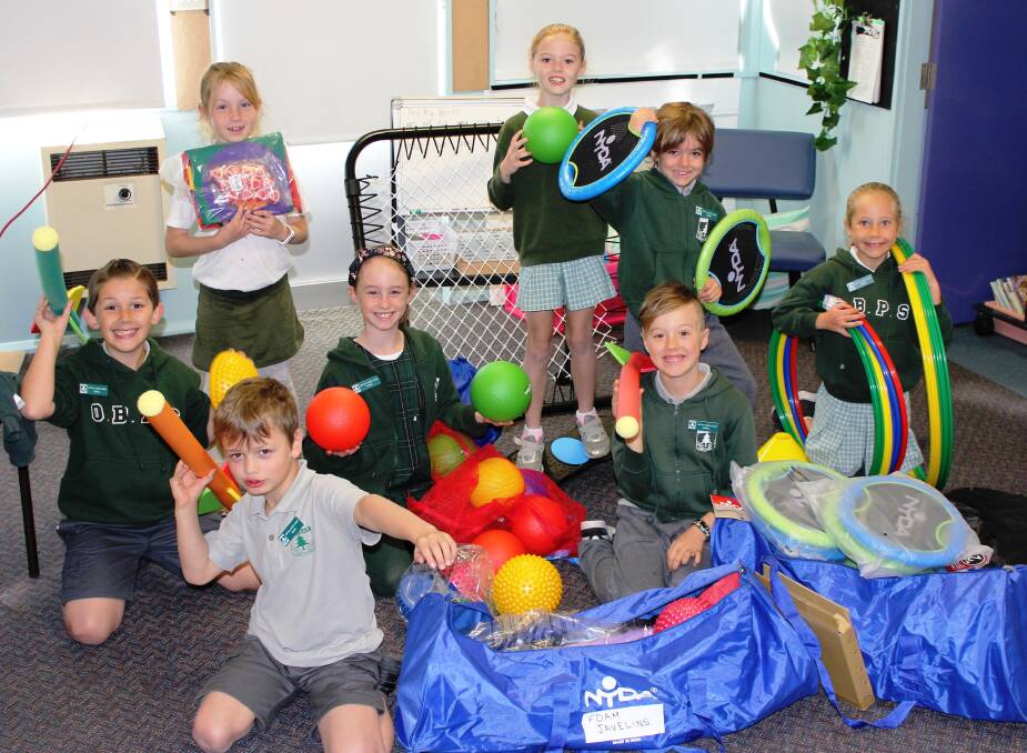 Students at Old Bar Public School with their new sporting equipment.