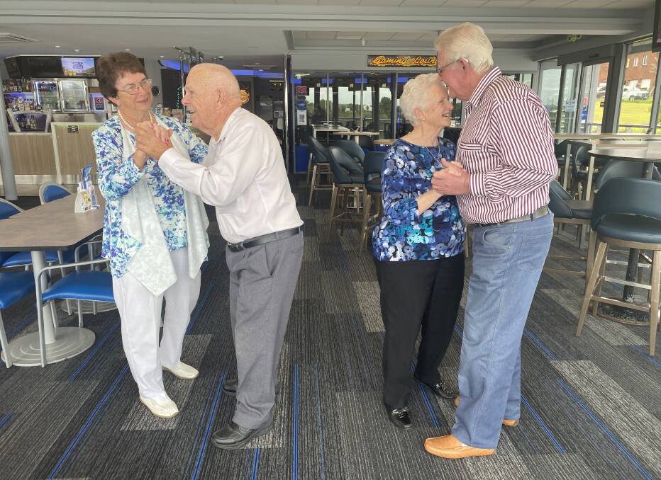 Margaret and John Pryor, and Barbara and Don Hinten enjoying a dance while they celebrate their anniversaries at Taree Aquatic Club.