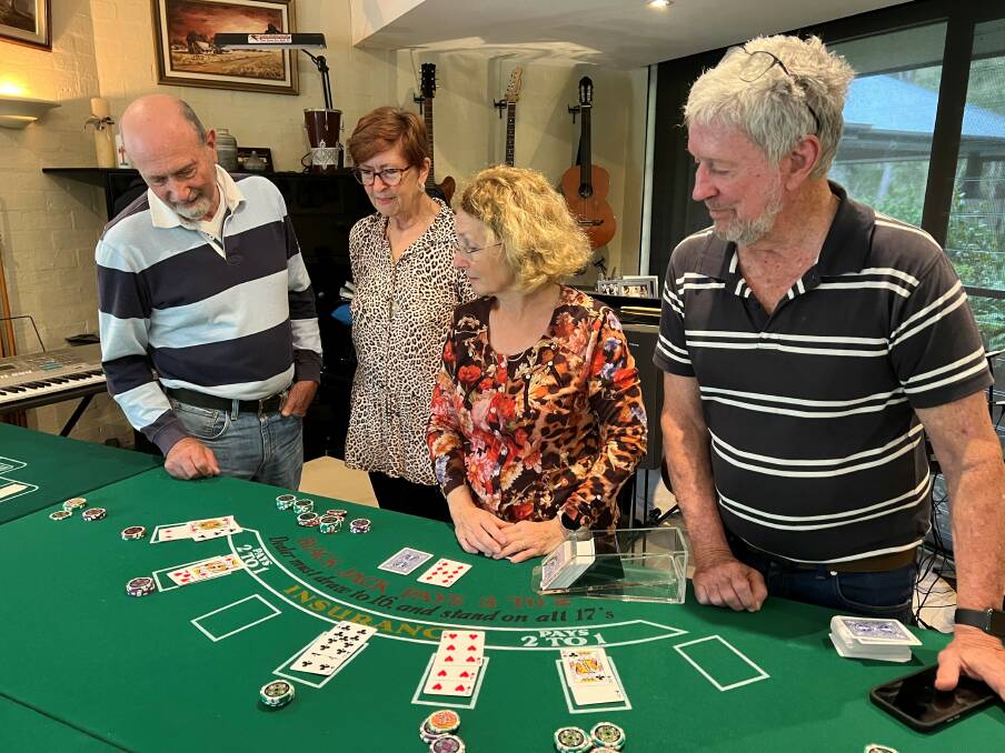 Rotary Club of Taree on the Manning members getting in some practice at the blackjack table ahead of the Casino Royale Ball. Picture supplied