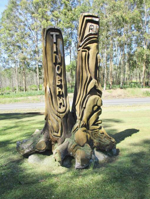 The woodcarvings by Uncle Russell Saunders at the entrance to Tinonee. Photo: Pam Muxlow
