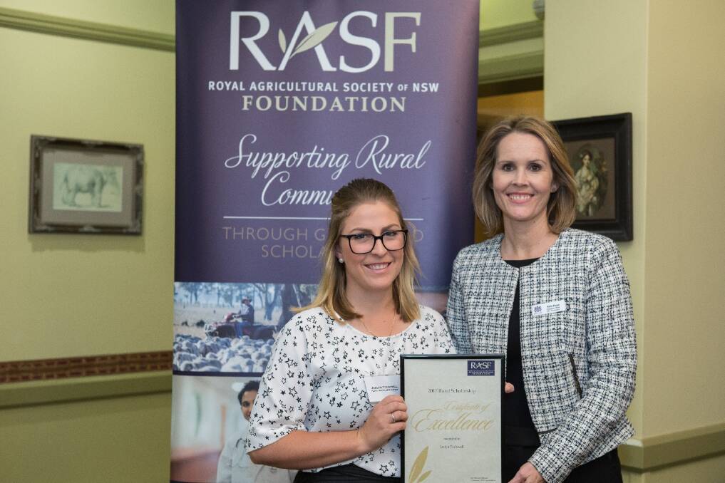 Jaslyn Tuckwell receiving her award from award from RAS Foundation executive officer Kate Ross.