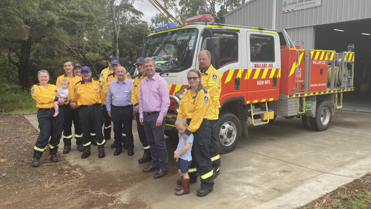 Members of the Wallaby Joe brigade with Ferderal Member for Lyne Dr David Gillespie and MidCoast Council deputy mayor Alan Tickle at the funding announcement. Photo: Julia Driscoll