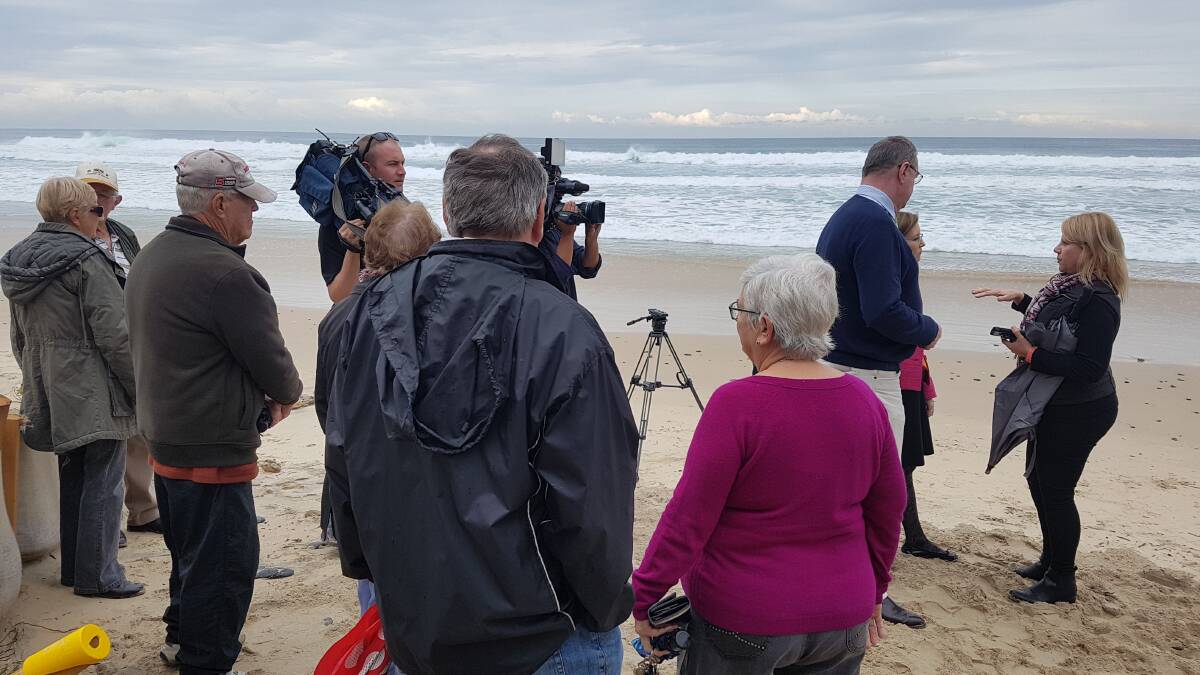 Minister for the Environment Gabrielle Upton being interviewed for televsion on Old Bar Beach about the sand scraping trial funding.