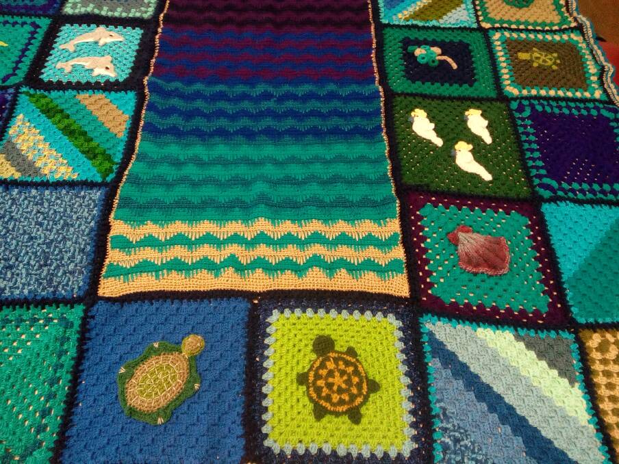 Detail on a section of the crocheted rug being offered as a raffle prize. Photo supplied