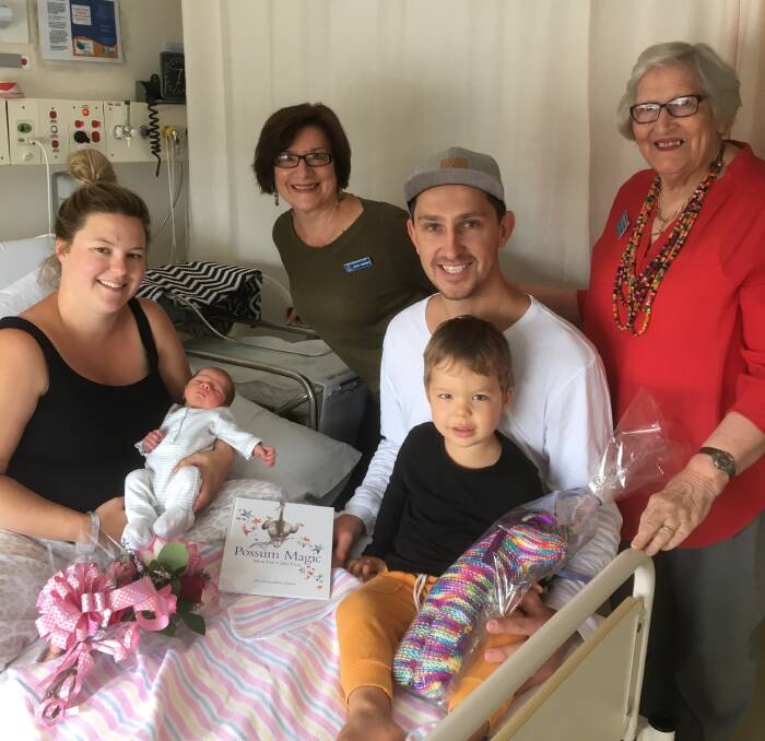 Quota baby of the year: The Stricker family, with Quotarian Jackie Wiseman (back) and Taree Quota president Jeanette Holland. Photo: supplied