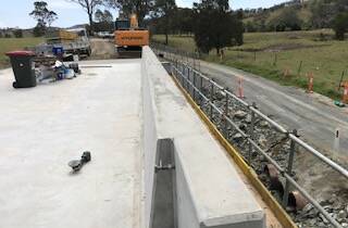 One of a number of bridges in the MidCoast region being replaced, The Cedar Creek Bridge on Willina Road at Bunyah is expected to be completed in November. Photo supplied