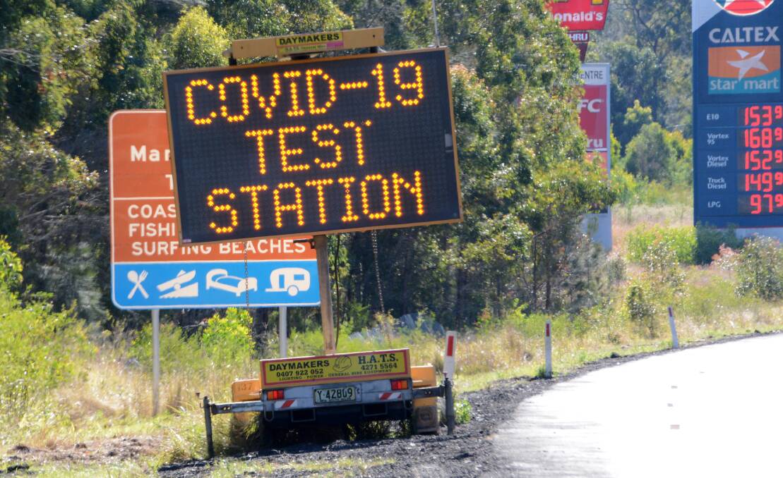 The sign for the Taree South Service Centre freight workers testing station on the Pacific Highway. Photo Scott Calvin
