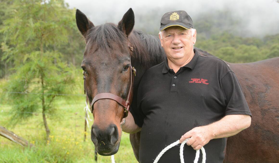 Rodney and one of his retired police horses, Gallant. Photo by Ainslee Dennis