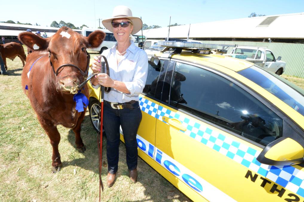 Rural woman worth celebrating: Chief Inspector Christine George at the 2013 Taree Show with Venus, which won champion shorthorn heifer in the show. Photo: Scott Calvin