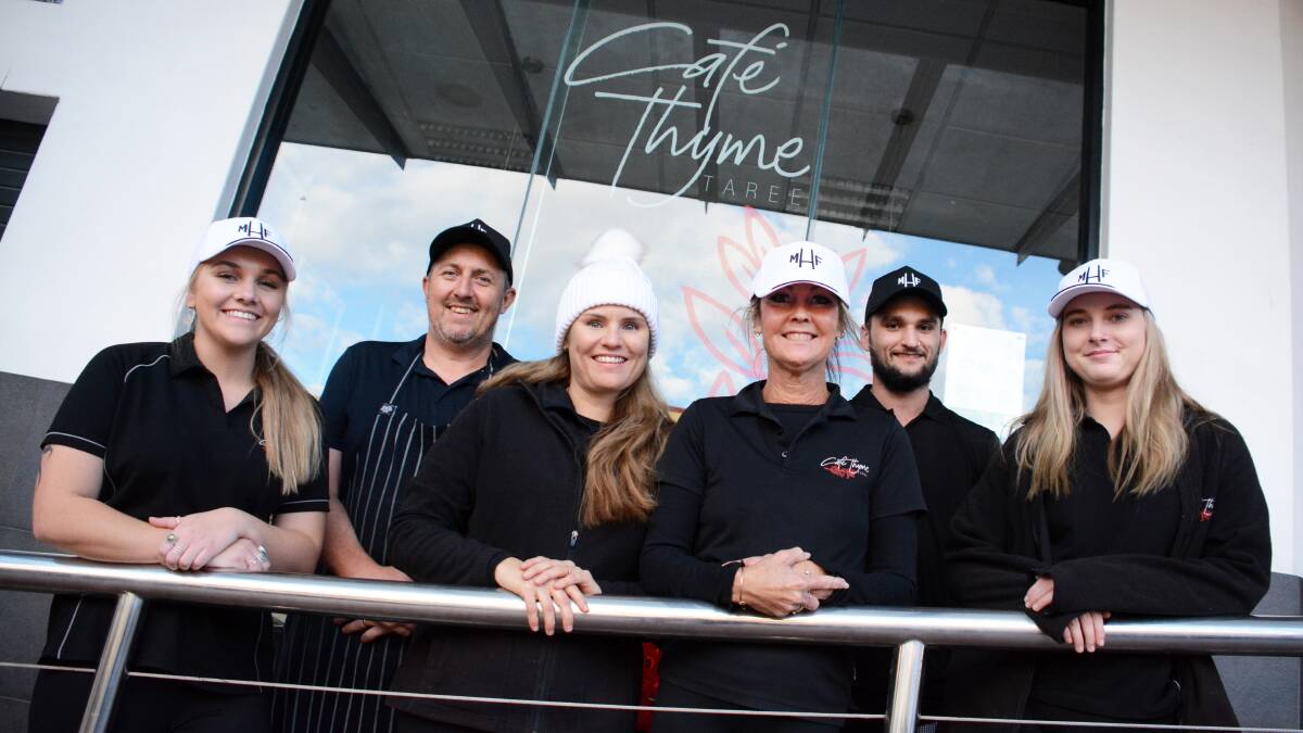 The Cafe Thyme team in Taree wearing their Mark Hughes Foundation caps and beanies ahead of their Beanie for Brain Cancer fundraiser. Photo: Scott Calvin