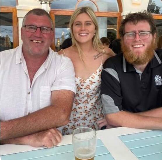 Makayla Foster with father Roch and brother Brendan at her 21st birthday celebratory lunch. Photo: supplied