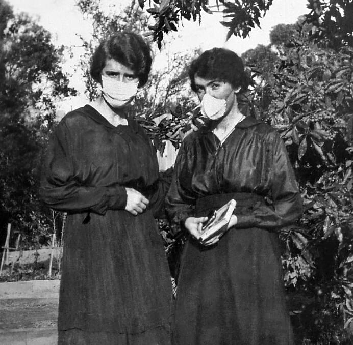 Familiar sight: Manning Valley girls masked up for an influenza drill in 1920. Photo: Manning Valley Historical Society/Wingham Museum