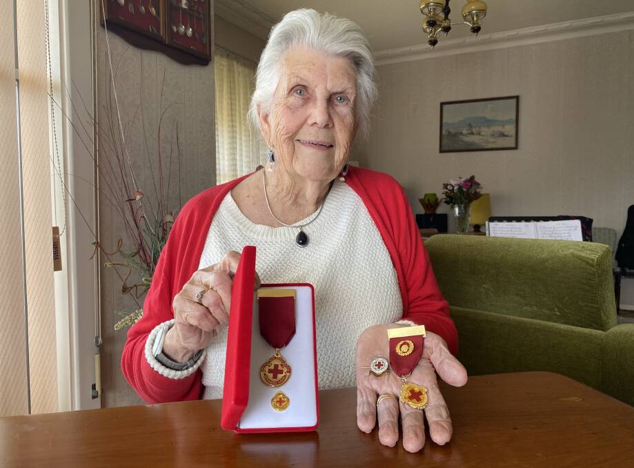 Outstanding service: Veronica Hobson displays the many medals she has been awarded during her time volunteering for the Red Cross. Photo: Julia Driscoll