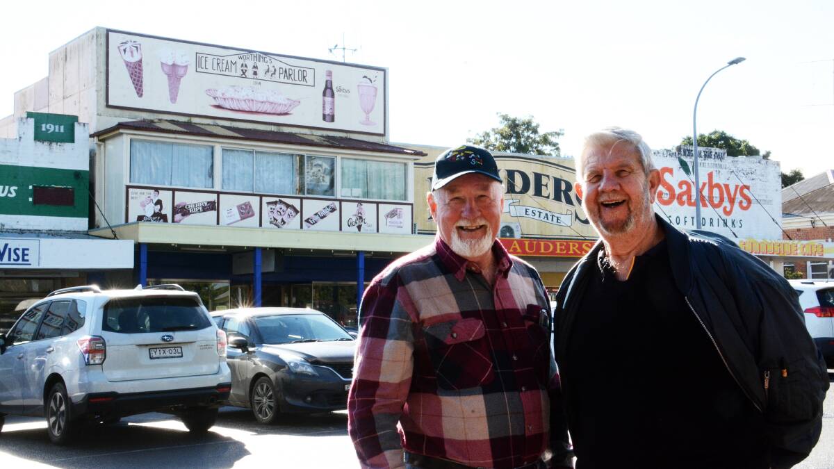 Ron Hindmarsh and Ron Irwin from Art and Soul in Wingham with the mural they painted for the building that was originally Mrs Worthing's Ice Cream Parlor. Photo: Scott Calvin