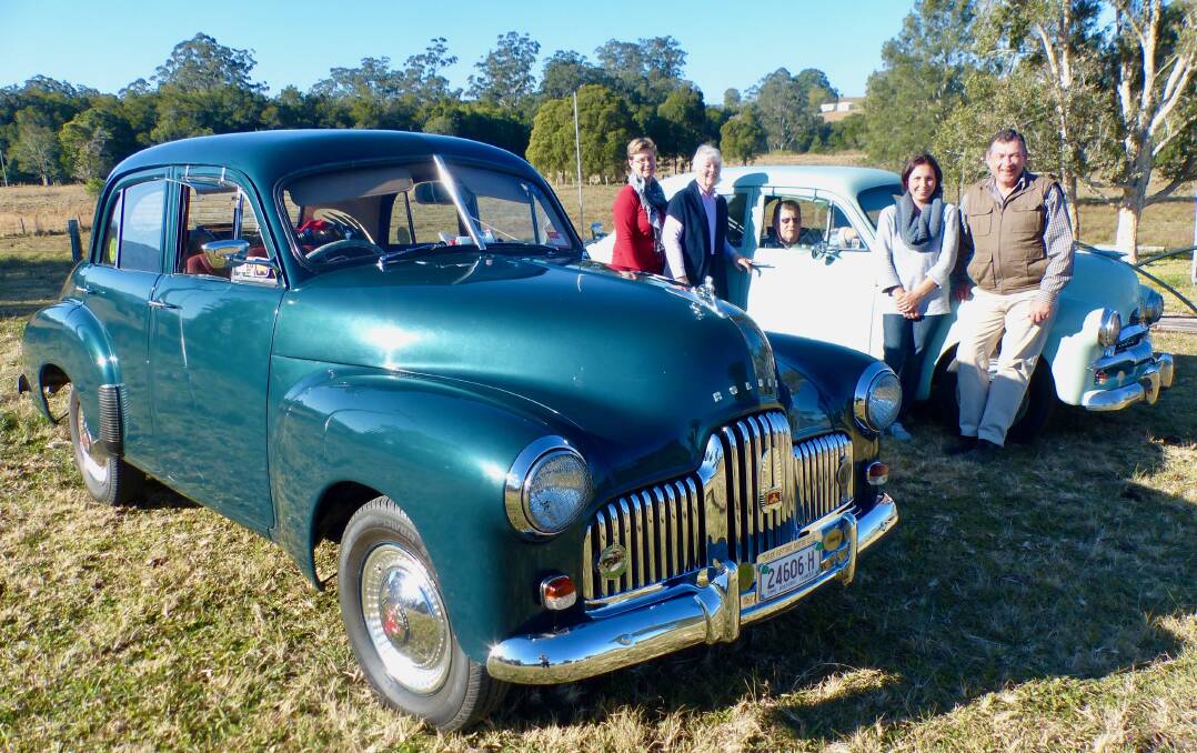 Killabakh’s ‘A Day in the Country’ committee members Michelle Swannack, Judith Jackson, Anna Axisa and George Hoad admiring Jim Hull’s (seated) prized vintage Holden cars to be displayed on Saturday, September 1.