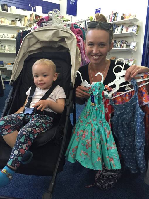 Op shop queen: Shelley McClure finds op shopping an ethically responsible way to clothe her growing daughter, Acacia. Photo: Julia Driscoll