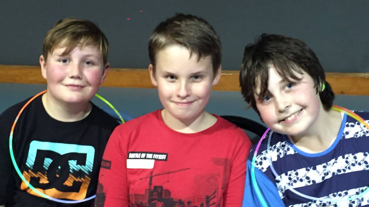 Tobias Bliss, Nicholas McCarey, and Dustin Green at the Wingham Blue Light Disco. Picture: supplied