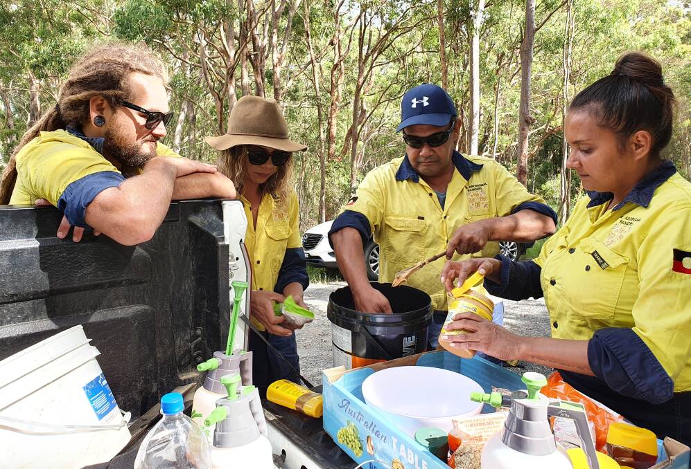 TIDE Indigenous rangers making up baits for fox control. Photo supplied