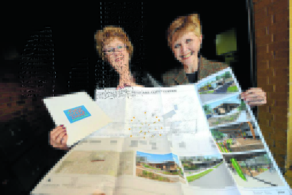 Frances Barberie and Rosemary Sinclair AO with the plans for the First Steps Count Child and Community Centre in Taree.