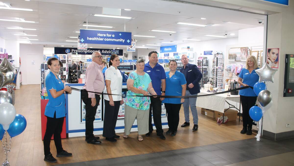 Pam Muxlow assists with the official name change of Advantage Pharmacy in Wingham. Picture supplied.