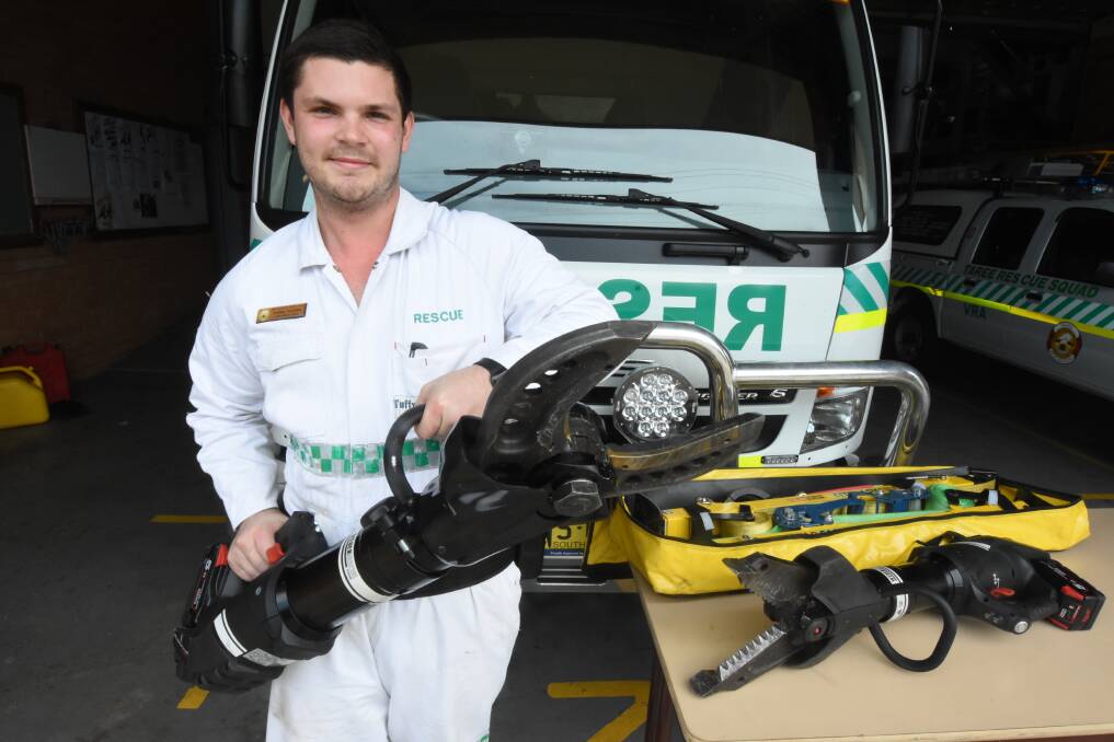 Taree VRA member Josh Goulden shows off the Jaws of Life purchased with community donations. Photo: Scott Calvin