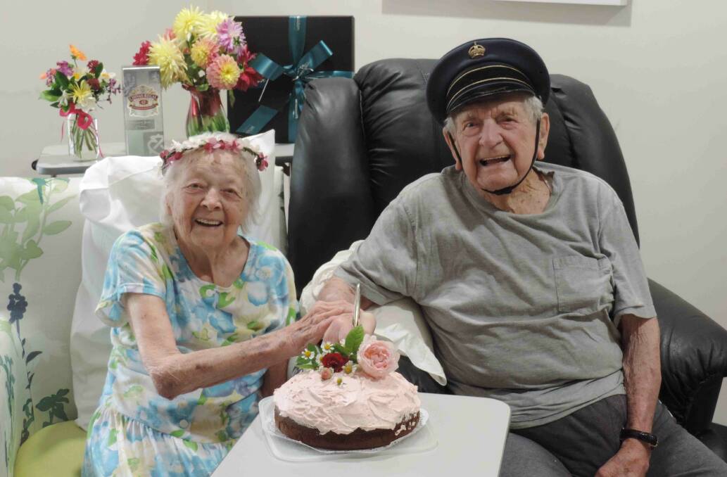 Happy couple: Hazel and Les Reeves celebrating their 75th wedding anniversary. Les is wearing his old station master's hat. Photo: supplied