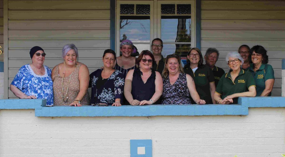 'Calendar girls' Carol Ann Makeef, Bronwyn Wallace, Dale Willcox, Sara Croker, Jennifer Carr, and Rebecca Huntley with Can Assist Manning Valley members. Photo supplied
