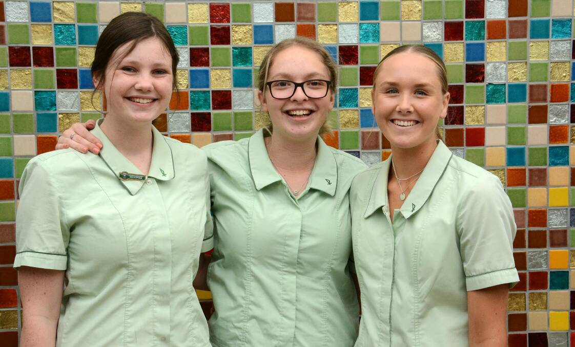 Elise Rourke, Emily de Berg and Cate Gillogly said the English exam was not as hard as they expected. Photo: Scott Calvin
