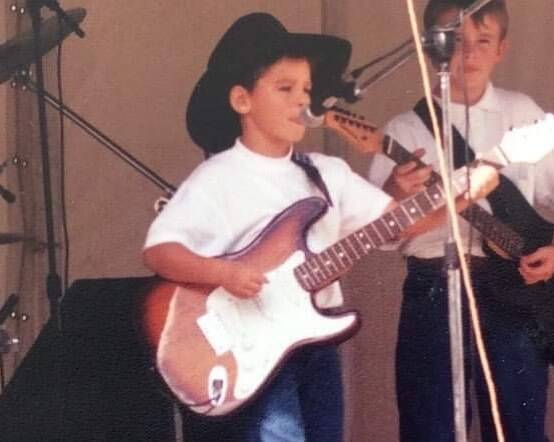 James Johnston performing on stage when he was six years old. Photo supplied