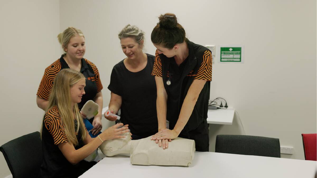 Rebecca Marley with Charles Sturt University nursing students at Taree Universities Campus. Picture supplied