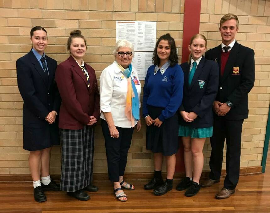 Stephen Smith (far right) with the four other competitors and Rotary District Governor, Lorraine Coffey (middle). Photo: Debbie Dunbier