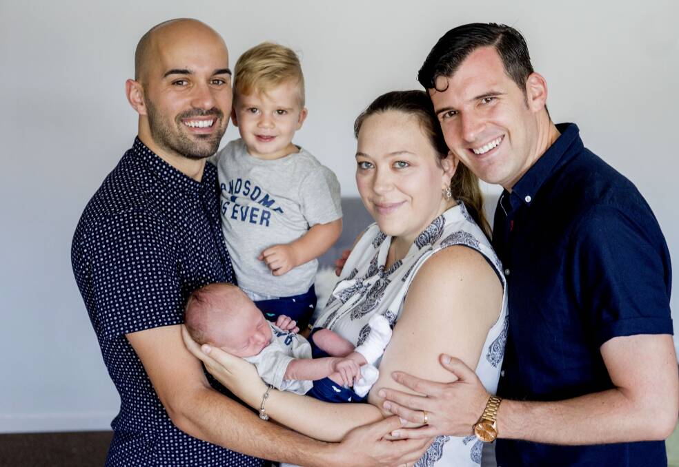 Extended family: Cassie Lake and baby Atlas, with fathers Christian Ruiz Gomez and Juan Fernandez Masip and their older son, Anxo Fernandez Ruiz. Picture: supplied
