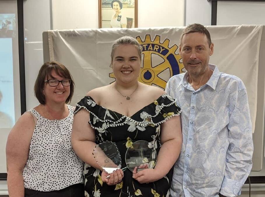 Young Health Worker of the Year: Katie Newcombe with parents Alison and Mark, at Taree SES where she was presented with the award. Photo supplied