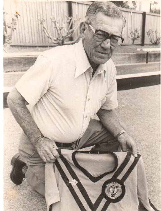 Harry Smith, pictured when he was awarded life membership of the Wingham Tigers in 1981.
