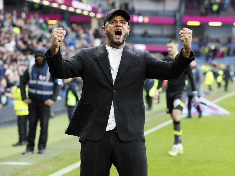 Burnley manager Vincent Kompany celebrates after a big win for his relegation-threatened side. (AP PHOTO)