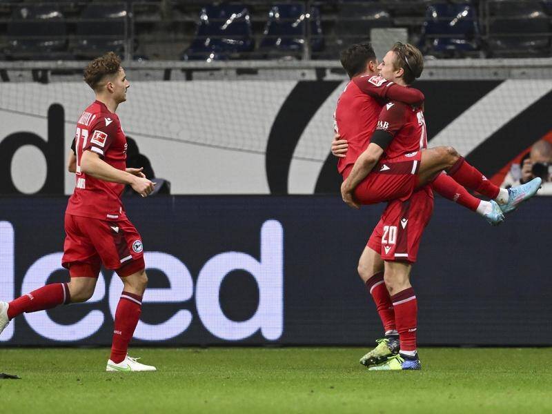 Bielefeld's Alessandro Schopf celebrates his goal with Patrick Wimmer (No.20) at Frankfurt.