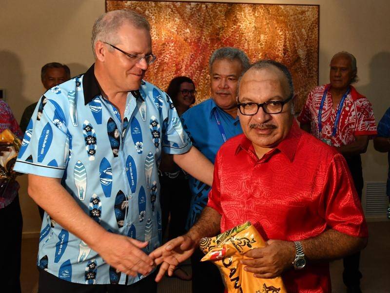 PNG prime minister Peter O'Neill, with Australian counterpart Scott Morrison, has resigned.