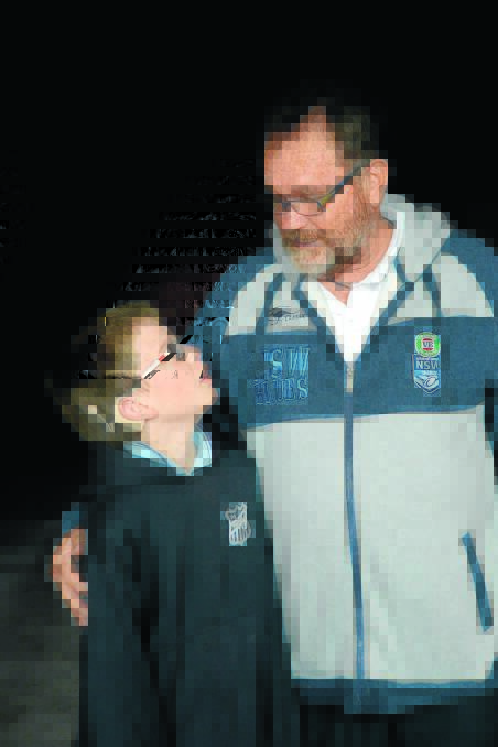 Jeremy Kelly and his dad David. Jeremy was diagnosed as being moderately or profoundly deaf shortly after his birth.