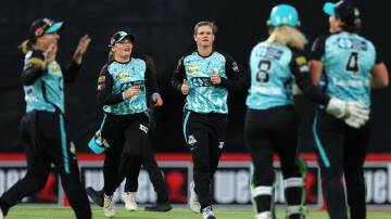 Brisbane Heat are through to the WBBL preliminary final after beating Sydney Thunder by 44 runs. (Richard Wainwright/AAP PHOTOS)